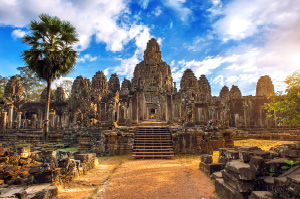 A view of the hidden Bayon Temple in the jungle heart of Angkor Thom.