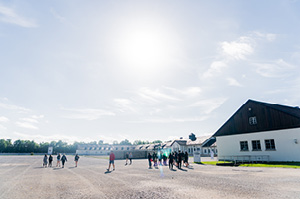 Crowds touring the site of Auschwitz-Birkenau.