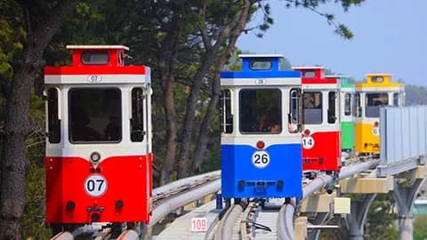 Colourful carriages on the Haeundae Sky Capsule rail experience.