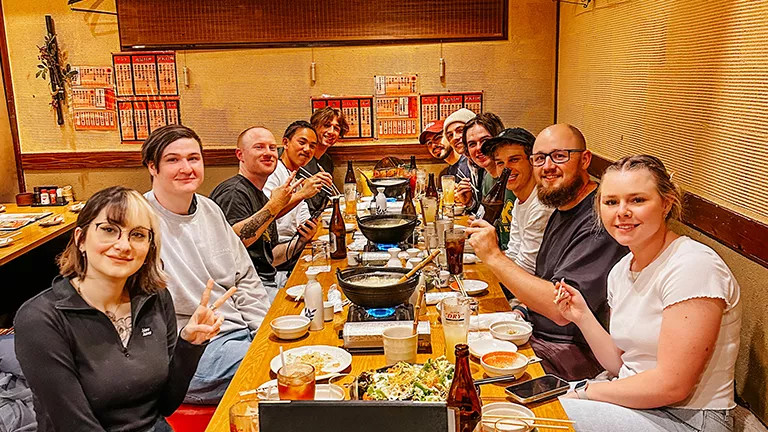 A group out eating at a traditional Japanese restaurant