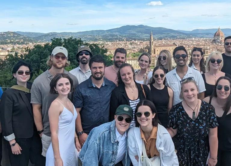 Topdeck travelers posing for a photo together in Florence.