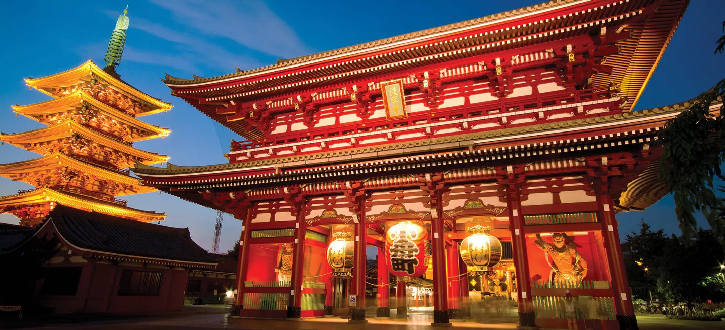 Sensō-ji Temple in Tokyo lit up at night.