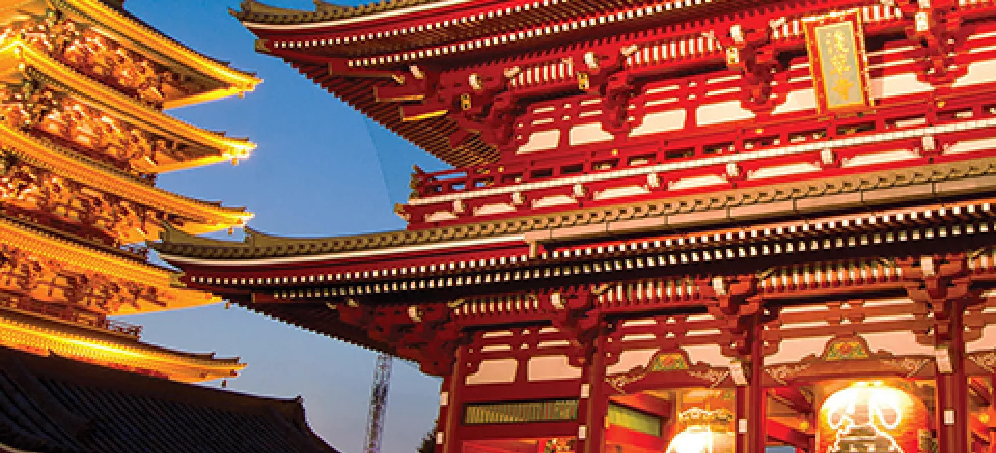 Sensō-ji Temple in Tokyo lit up at night.